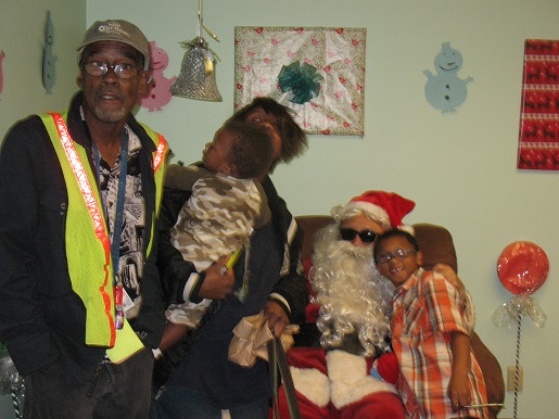 Santa posing with a family